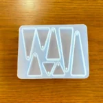 8 cavity trangle mould min qty 12pcs..UN.