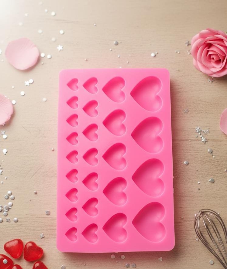 WhatsApp Image 2026-01-17 at 11.41.05 AM 25 Cavity heart pink mould size-1.5*16.5cm QTY-min 12 pcs 129 grm - Image 1