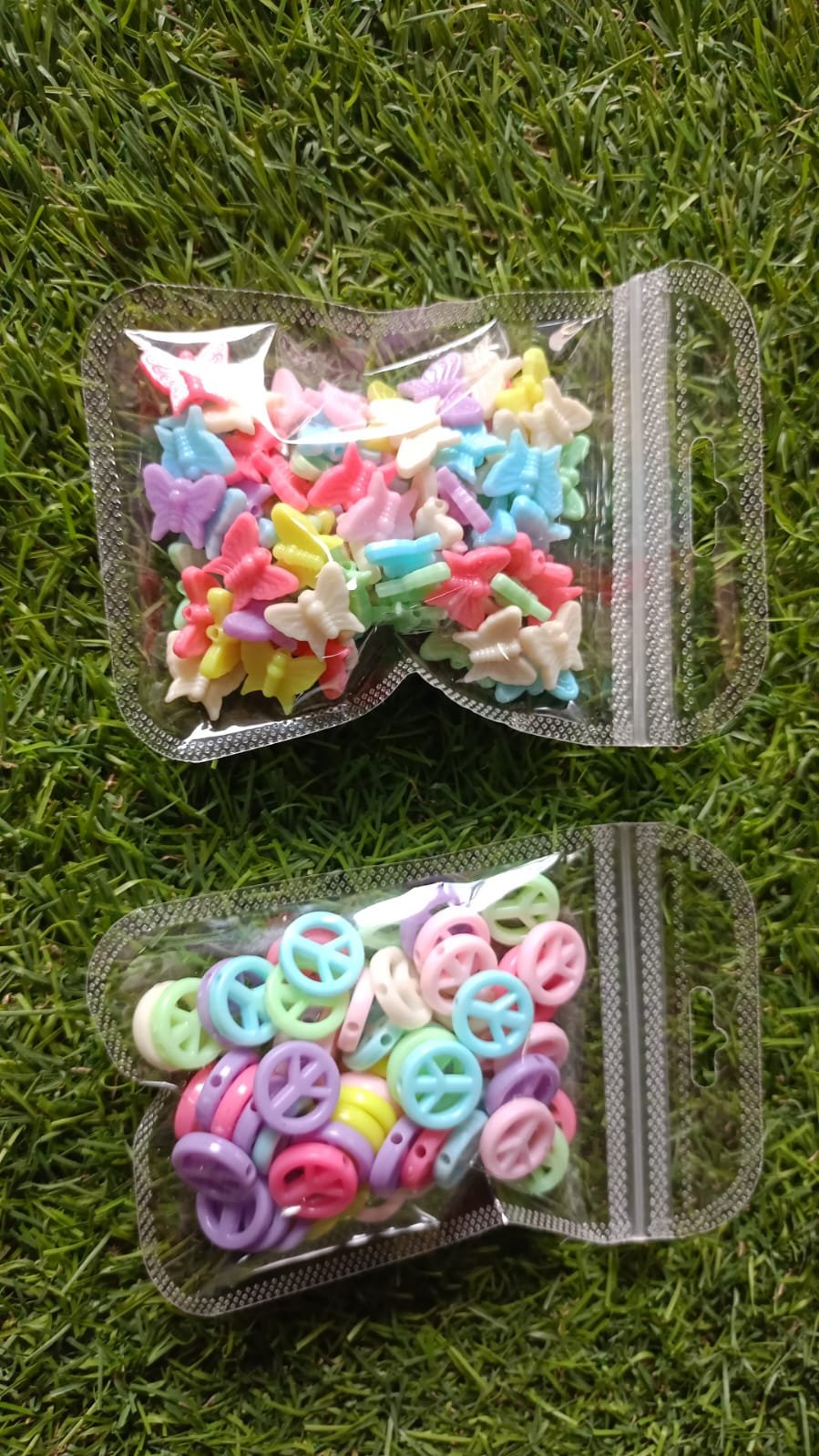 WhatsApp Image 2024-12-27 at 11.27.54 AM plastic butterfly and airoplain beads - Image 1