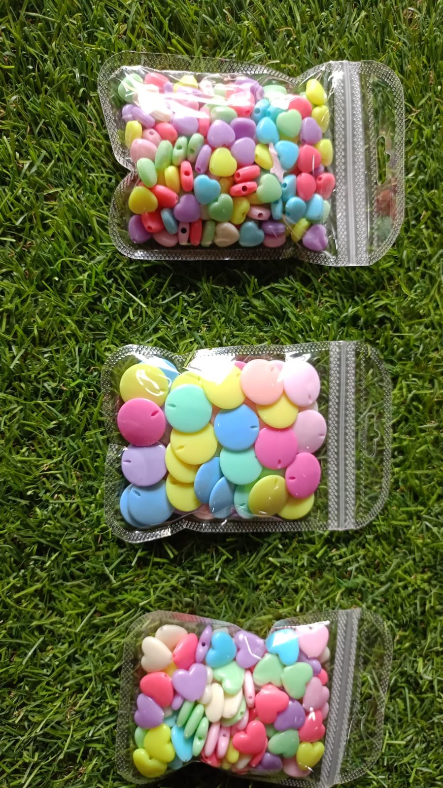 WhatsApp Image 2024-12-27 at 2.46.11 PM plastic heart and circle beads - Image 1